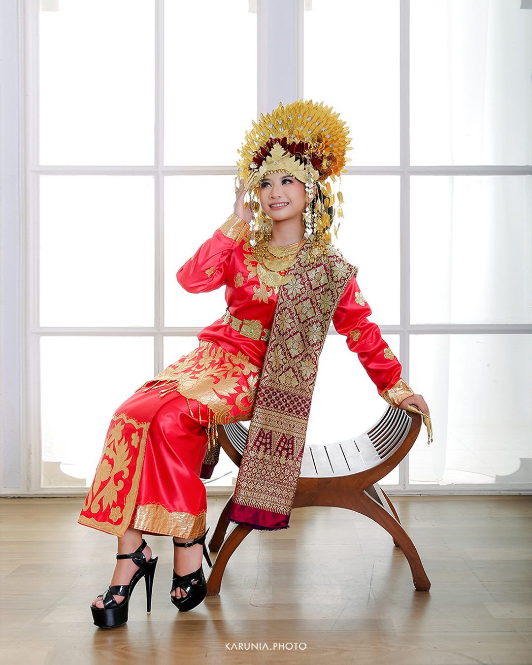 Artistic portrait with creative lighting effects casting geometric shadows across the subject's face